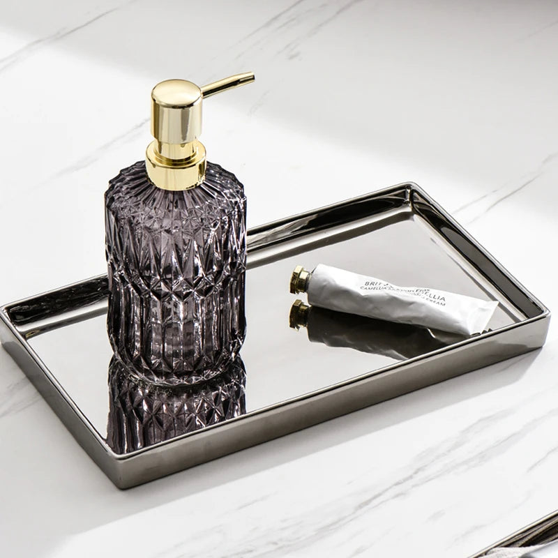 Large Silver Finish Decorative Tray - Featuring a modern silver design, used to hold  hand wash and hand cream on the bathroom countertop, for a sophisticated look.