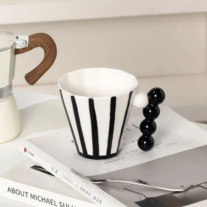 Retro Striped Ceramic Mugs in Black - Demonstrating the durable ceramic material and stylish retro aesthetics suitable for hot or cold tea, coffee, beverage, milk.