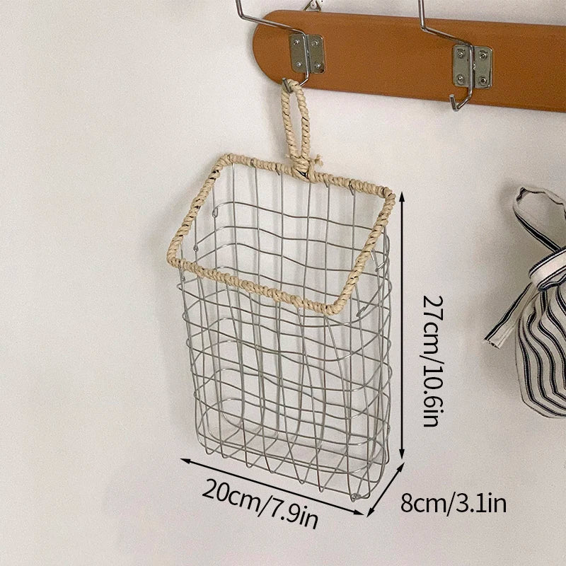 Detailed shot of the large hanging woven metal wire storage basket, emphasizing the quality craftsmanship and eco-friendly materials.