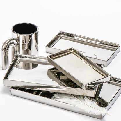 Rectangle Silver Decorative Tray in different sizes - Demonstrating its functionality and stylish design, perfect for entryways, bathroom, living room.