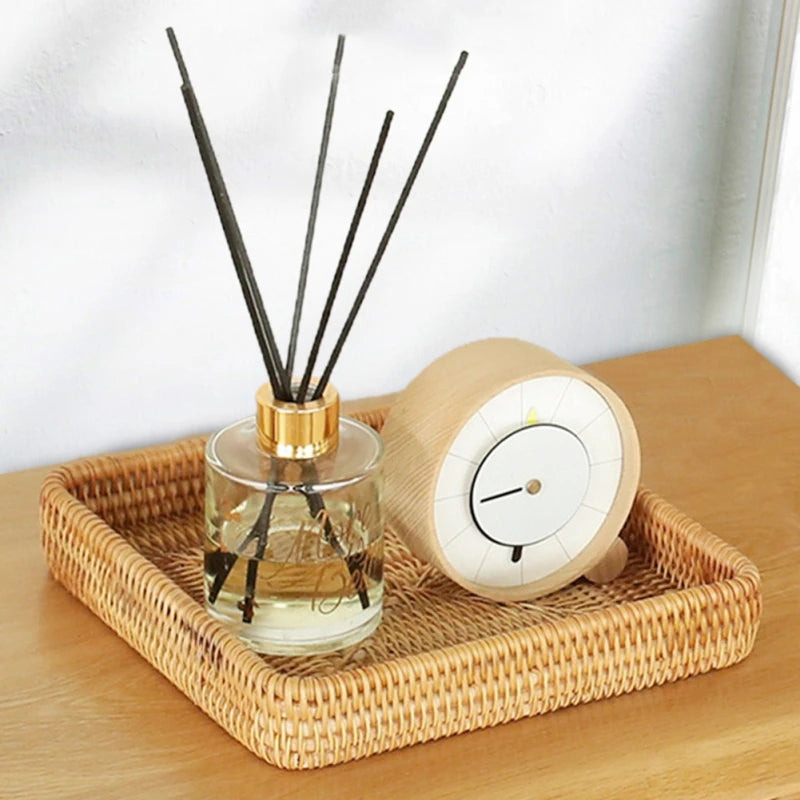 Rectangle wicker tray used for holding incense and decorative items, adding style to any space