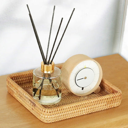 Rectangle wicker tray used for holding incense and decorative items, adding style to any space