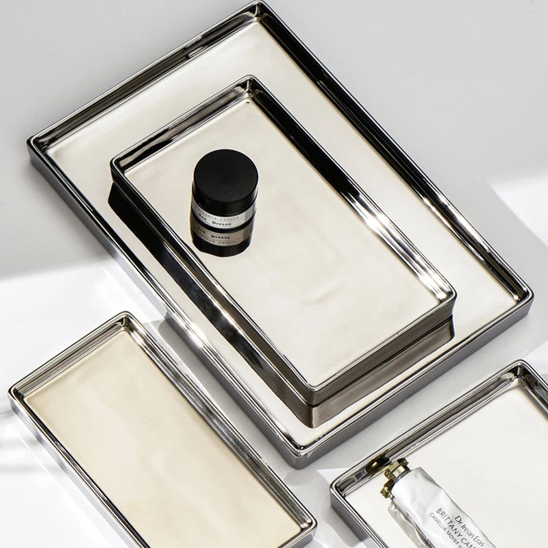 Rectangle Silver Finish Tray in different sizes - Perfectly displayed on a living room table, elegantly organizing keys and small accessories.