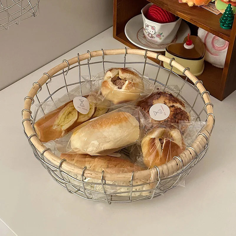 Scandinavia decoration metal wire basket holding a variety of breads, perfect for warm minimalism kitchens.