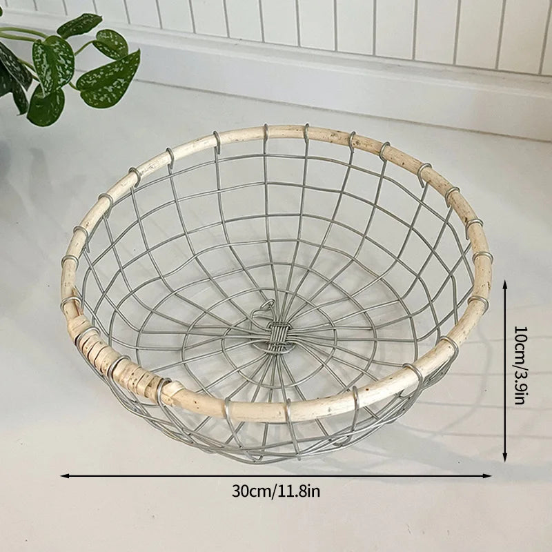 Detailed view of the large round woven metal wire basket, showcasing its durable metal construction and natural rattan elements for Scandinavian minimalism.