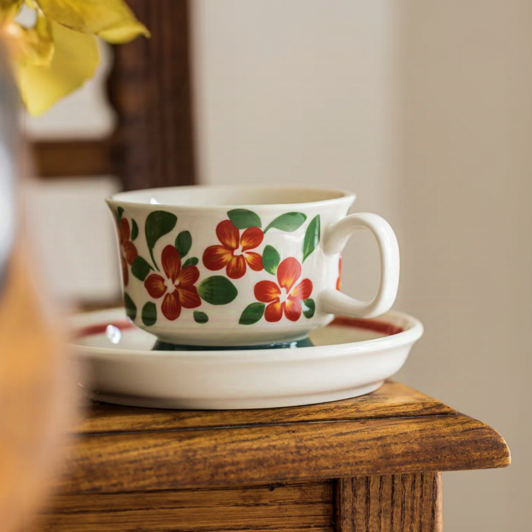 Scandinavian-style floral ceramic cup placed on a wooden table, blending natural aesthetics and functionality.