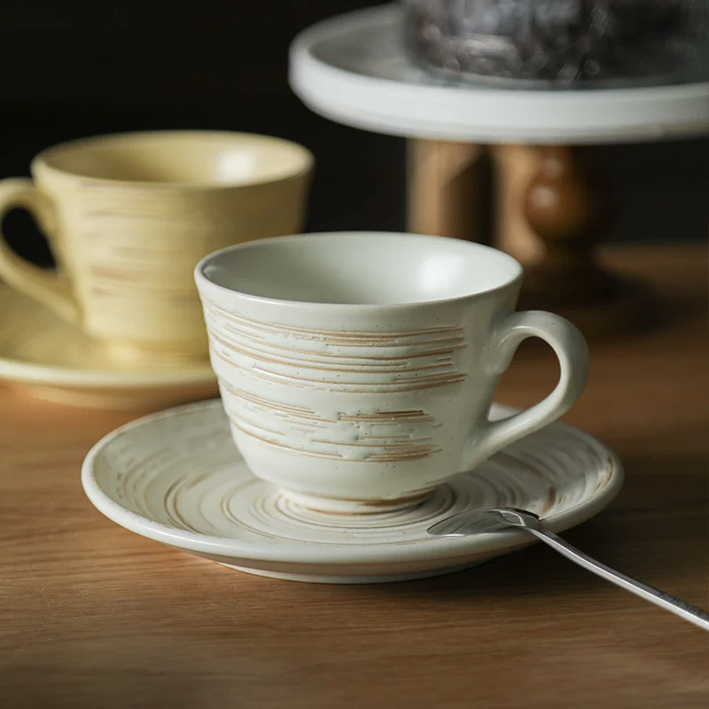 Stylish warm-yellow pottery mug with a handcrafted finish, perfect gift for cozy home rituals. 