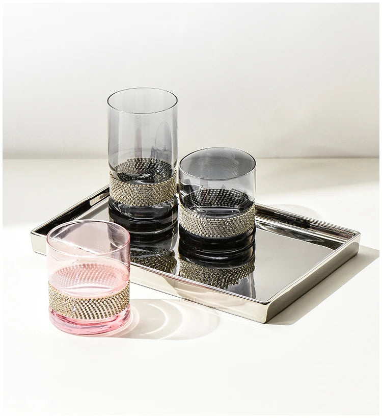 Silver Rectangle Tray with Glasses and cups - Showcasing the tray's versatility in organizing and presenting items on a bathroom countertop.