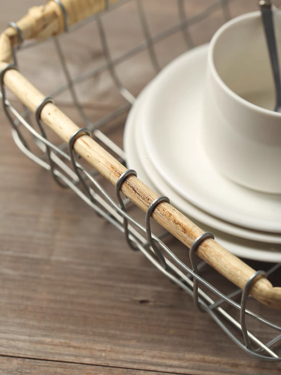 Detailed view of the square woven metal wire basket, emphasizing the craftsmanship and quality of its eco-friendly materials.