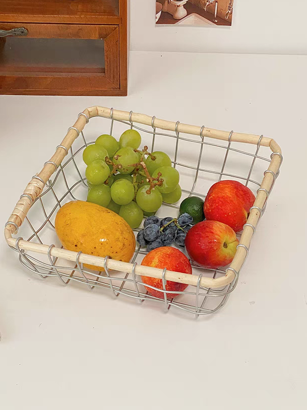 Eco-friendly square storage basket filled with fresh fruits and vegetables, combining natural rattan with durable metal wire.