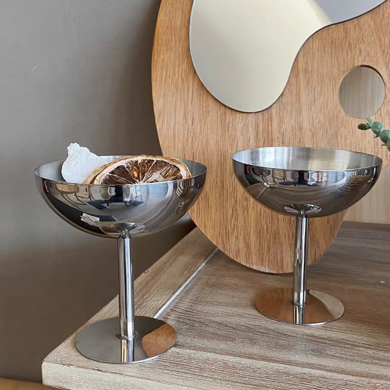 Stainless steel dessert goblet used for serving creamy dessert, highlighting its sleek design