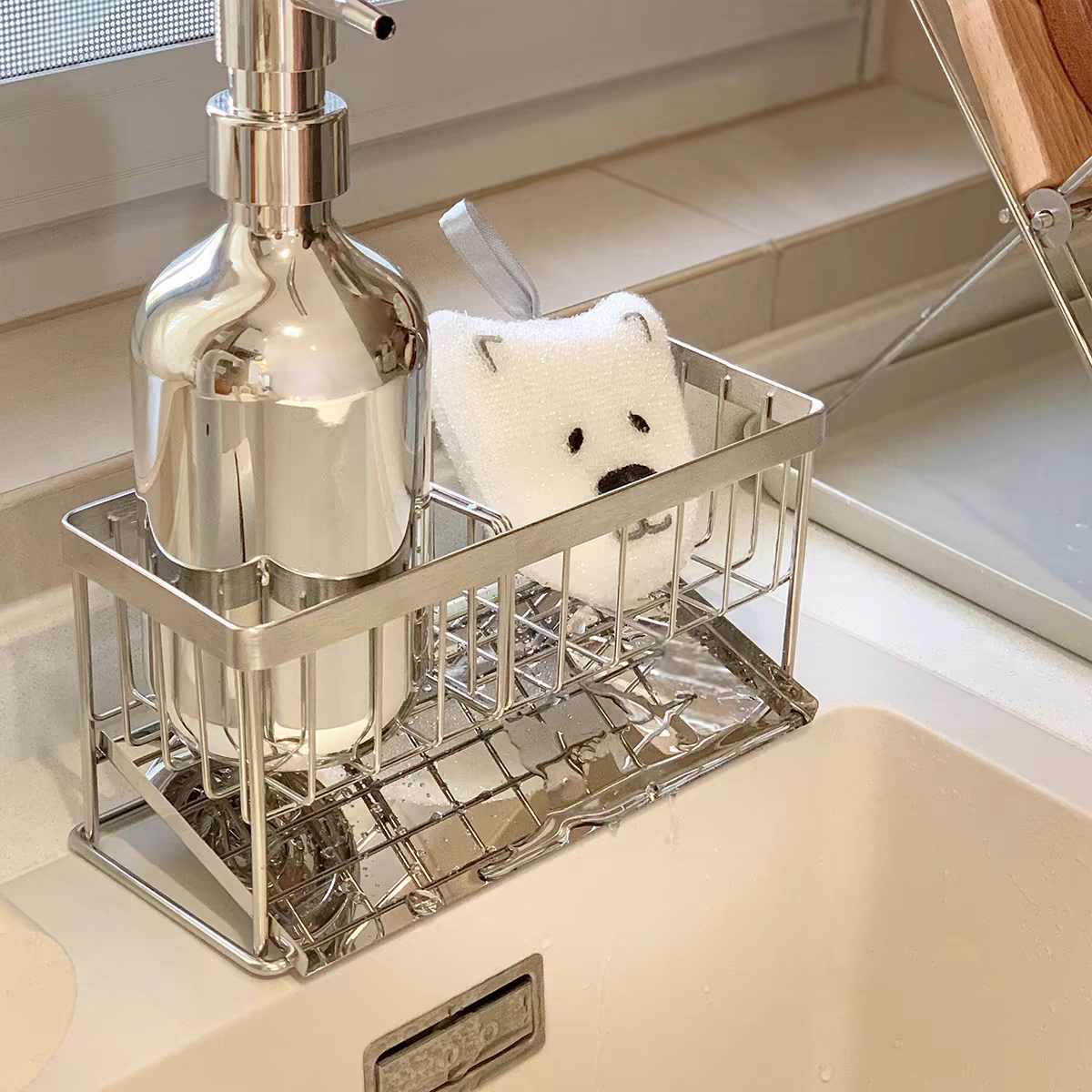 Practical metal rack with removable drip tray, perfect for keeping kitchen sink and bathroom countertops tidy.